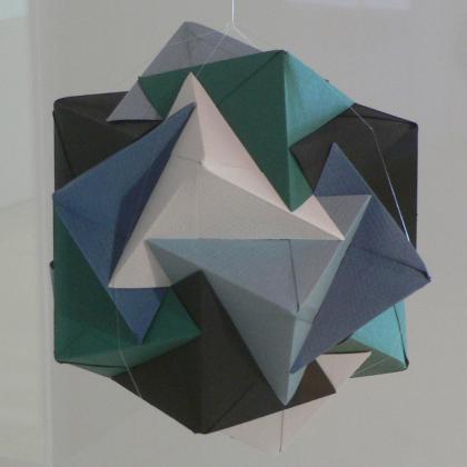 The Partial Compound of Five Cubes